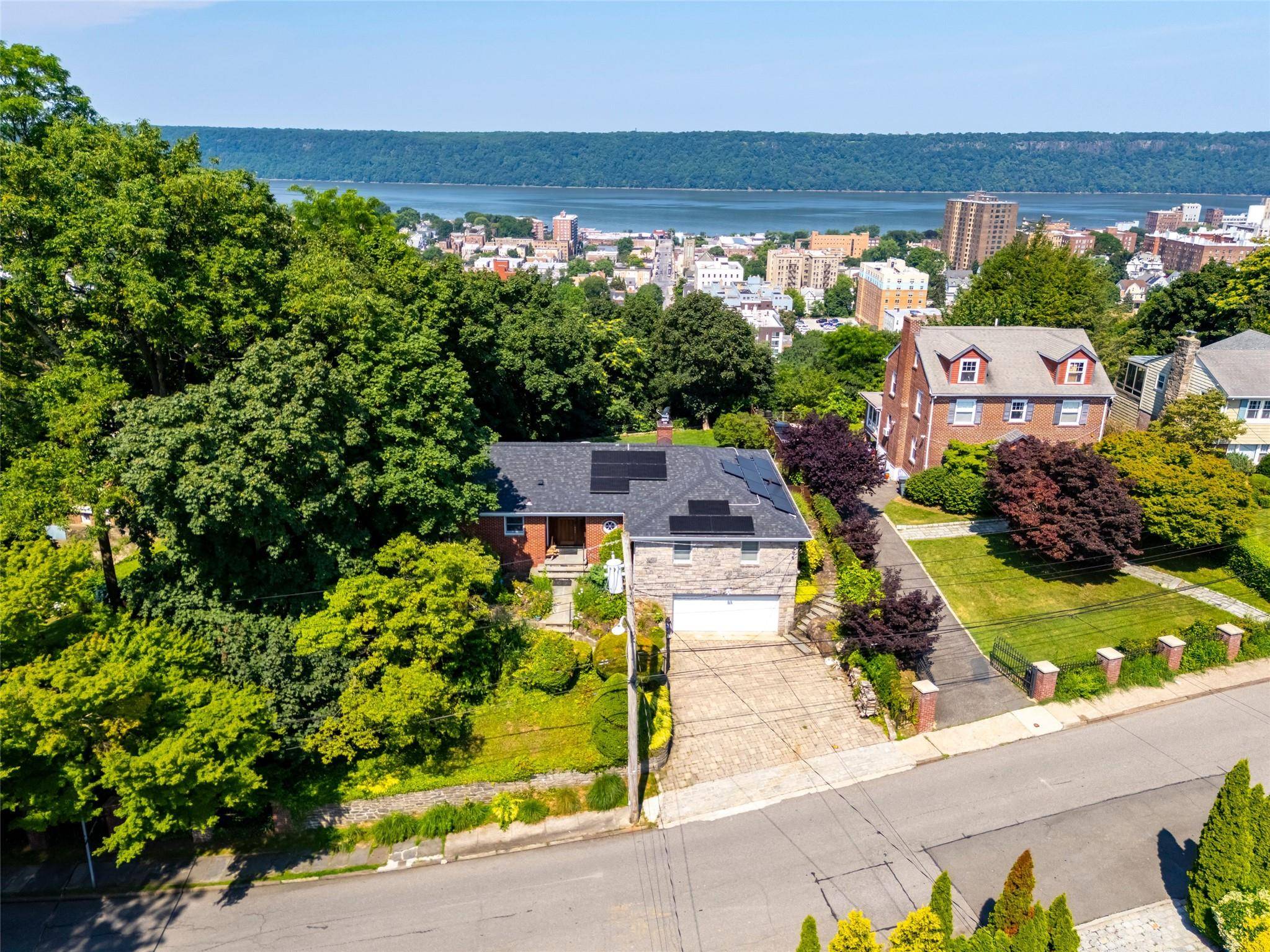 Welcome to this beautifully updated brick ranch style home in Park Hill, offering stunning Hudson River views and just 20 minutes from Manhattan.