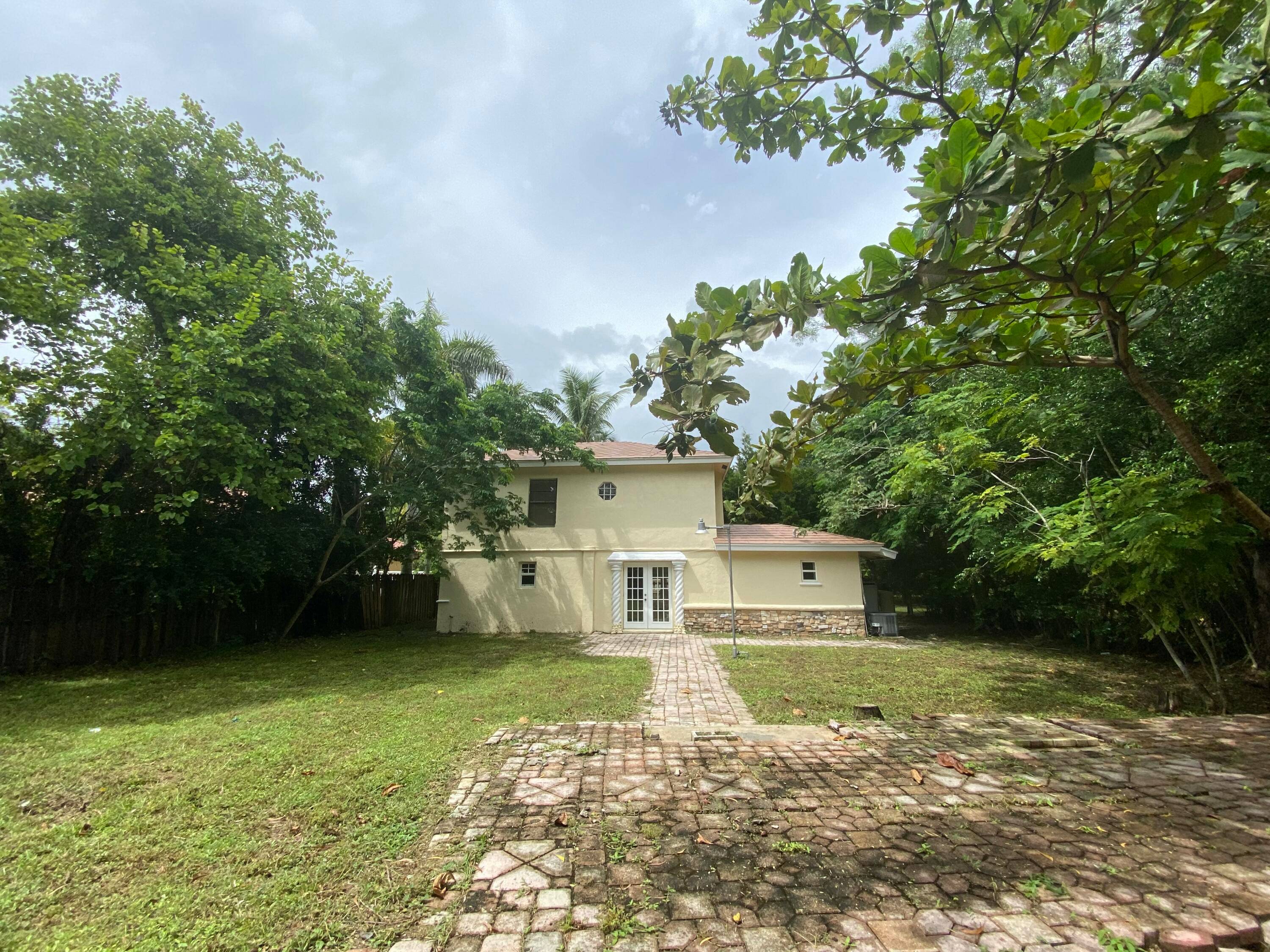 Endless of possibilities property situated on over 1 acre lot, No HOA, prime location close to wellington mall, Okeeheelee park, easy access to the turnpike, bring your boat, RV'sUnbranded Virtual ...