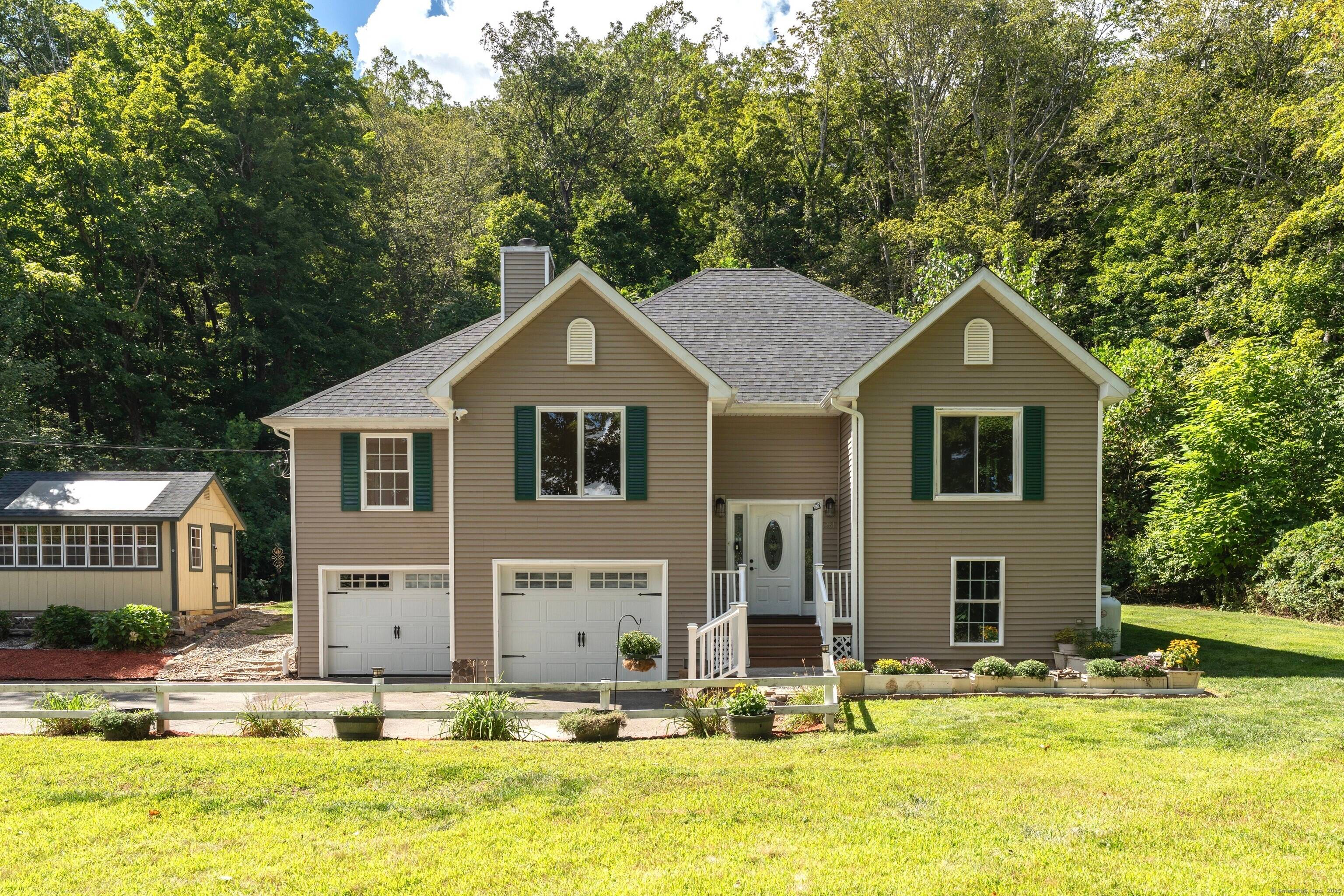 Light, space, and style come together beautifully in this Contemporary Raised Ranch.