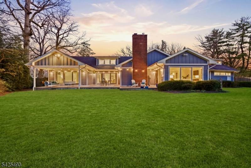 Set in the desirable Newstead neighborhood, this distinctive 1954 turn key mid century modern ranch is defined by light, scale, and a remarkable setting.