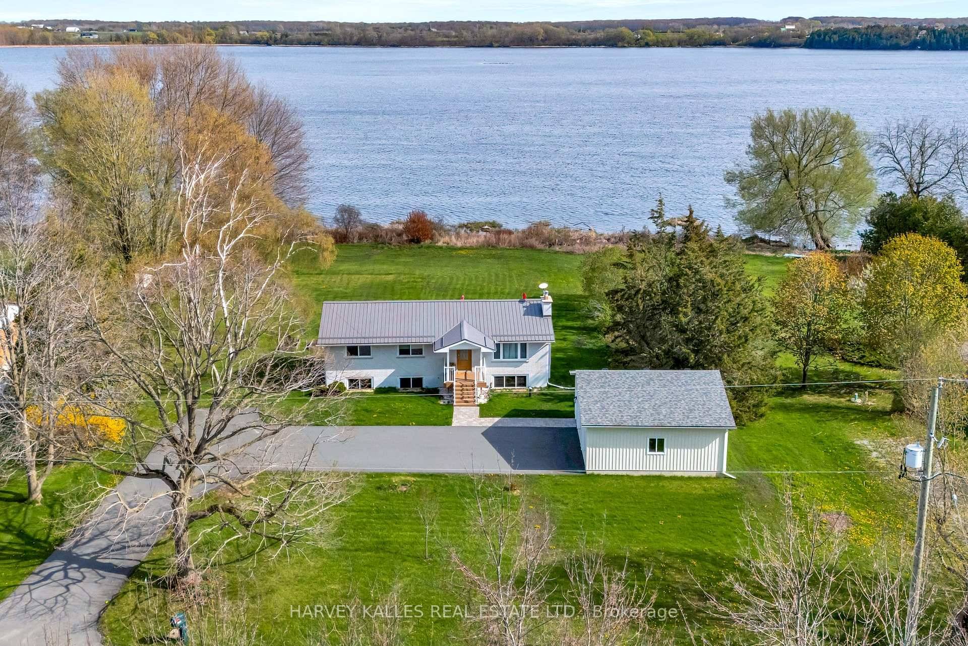 Let the beauty and tranquility of this stunning brick bungalow on Consecon Lake sweep you off your feet !