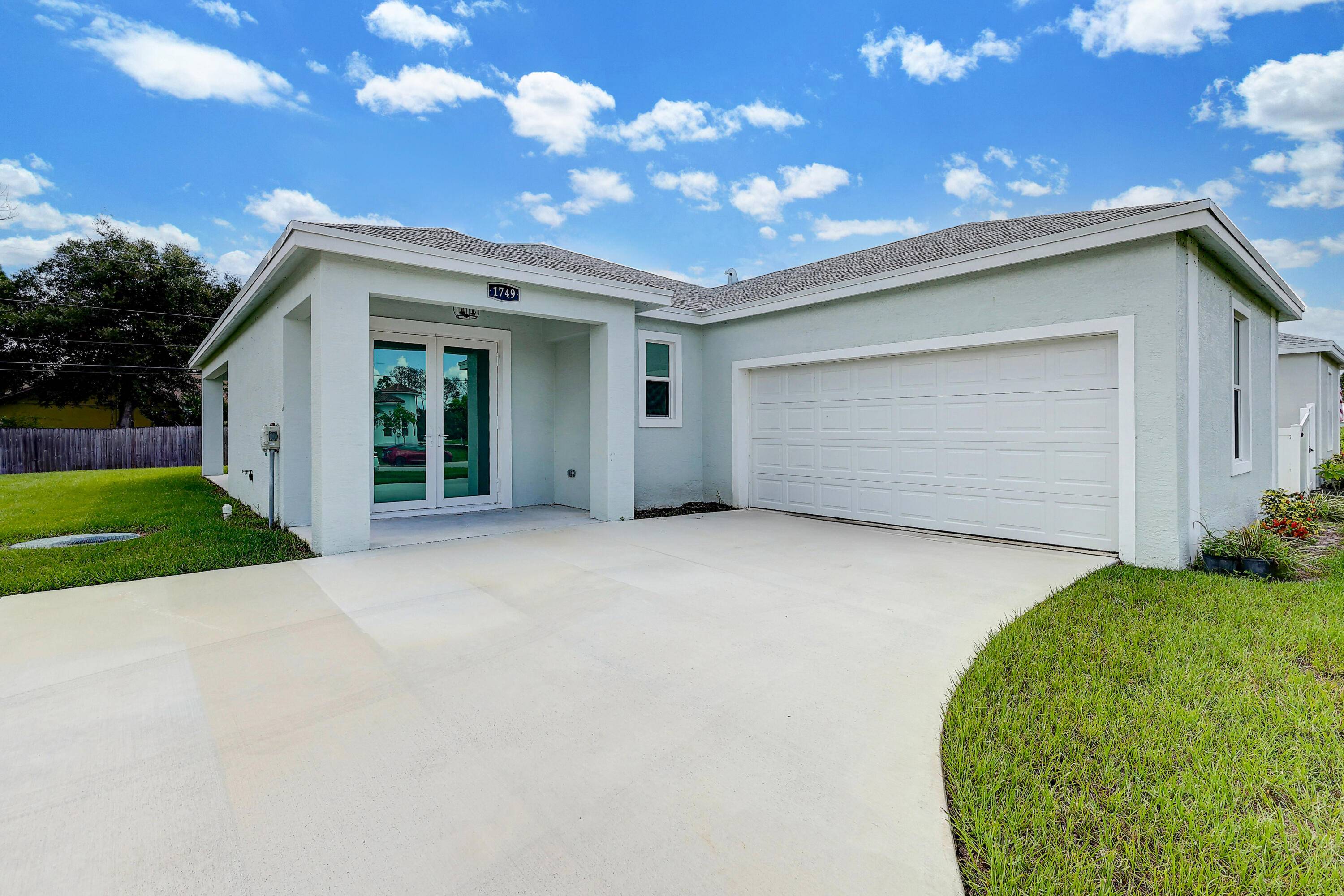 BEAUTIFUL 3 2 NEW CONSTRUCTION, IMPACT WINDOWS ENTIRE HOME, MODERN KITCHEN WITH ALL THE APPPLIANCE, WASHER AND DRYER, FRAMELESS SHOWER GLASS IN THE MASTER BEDROOM, SPACIOUS FENCE BACKYARDA MUST SEE.