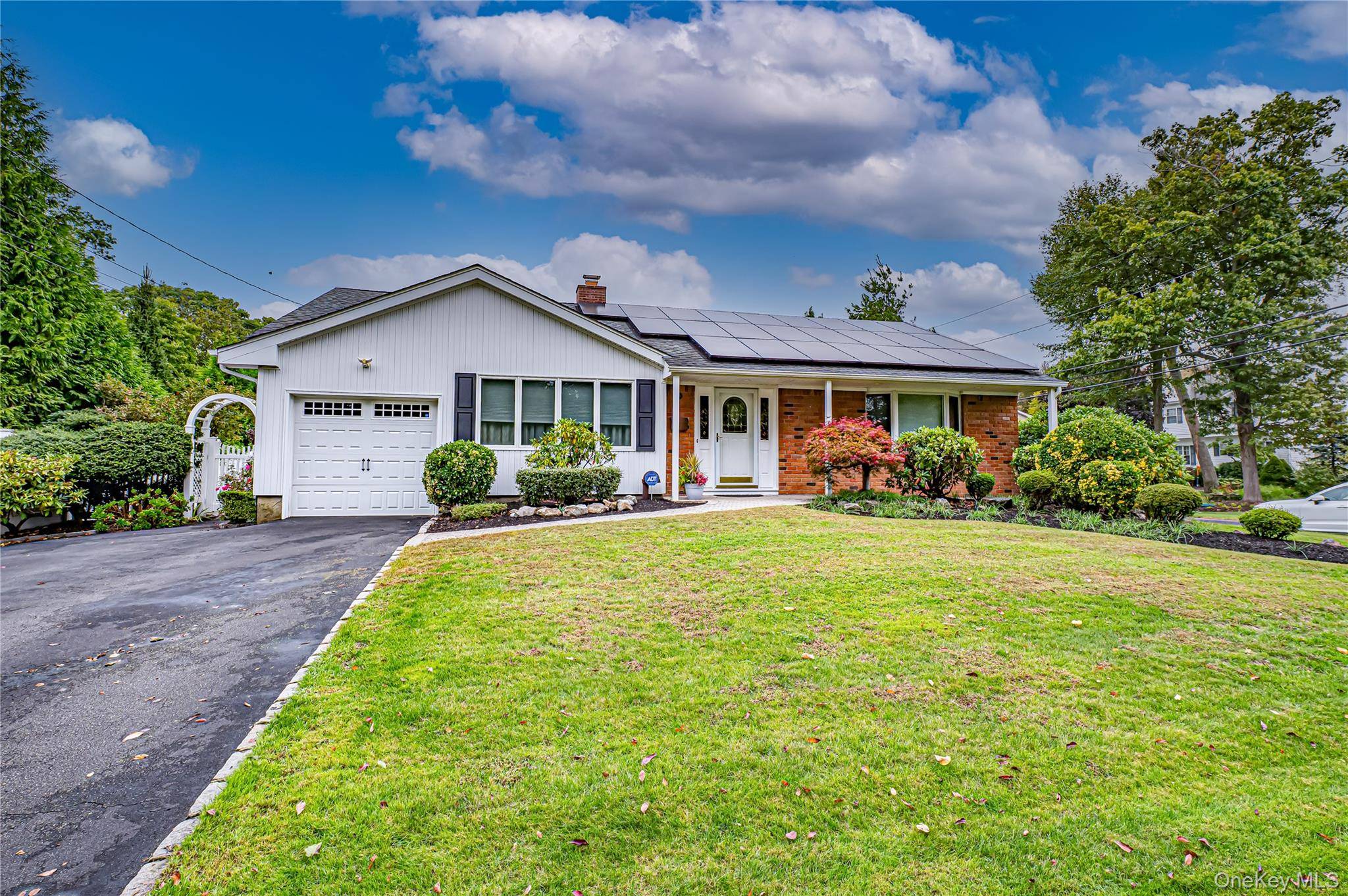 The Original Long Island Dream House Model This Home has a Unique Open Layout Floor Plan, with a Large Entry Foyer with Two Double Door Coat Closets.