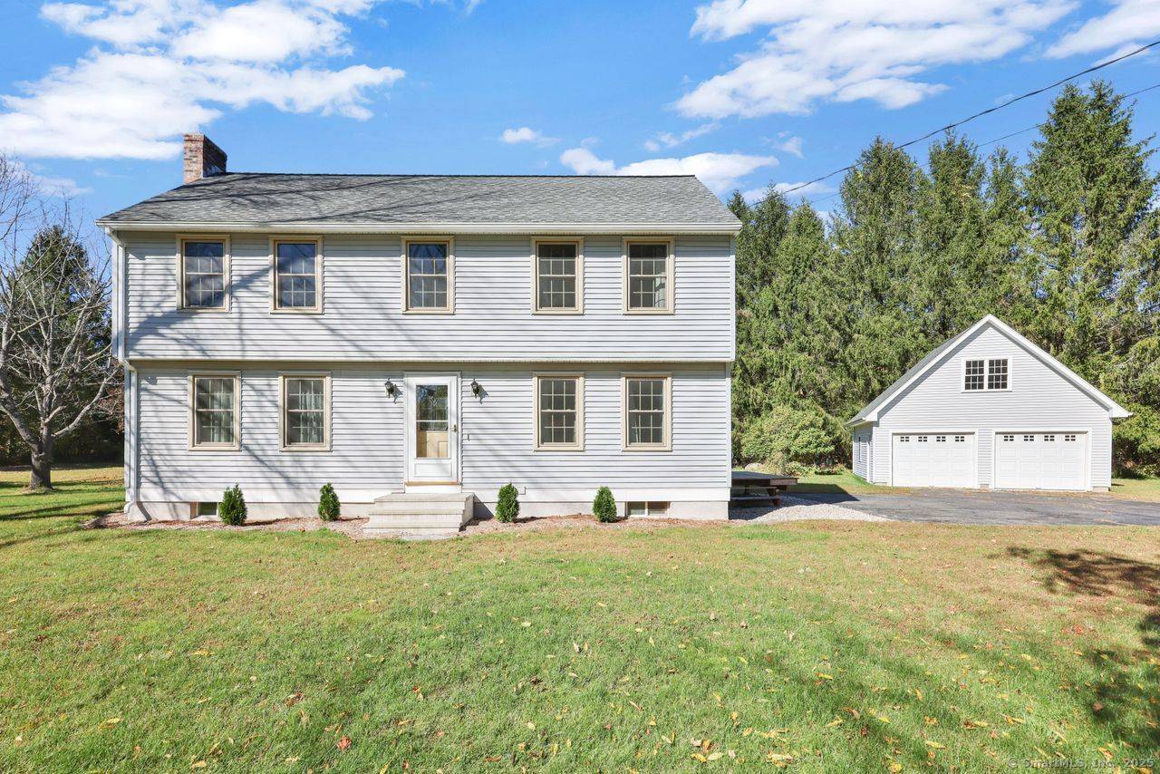 Large Saltbox on level lot, located less than 2 miles from UCONN campus, E.