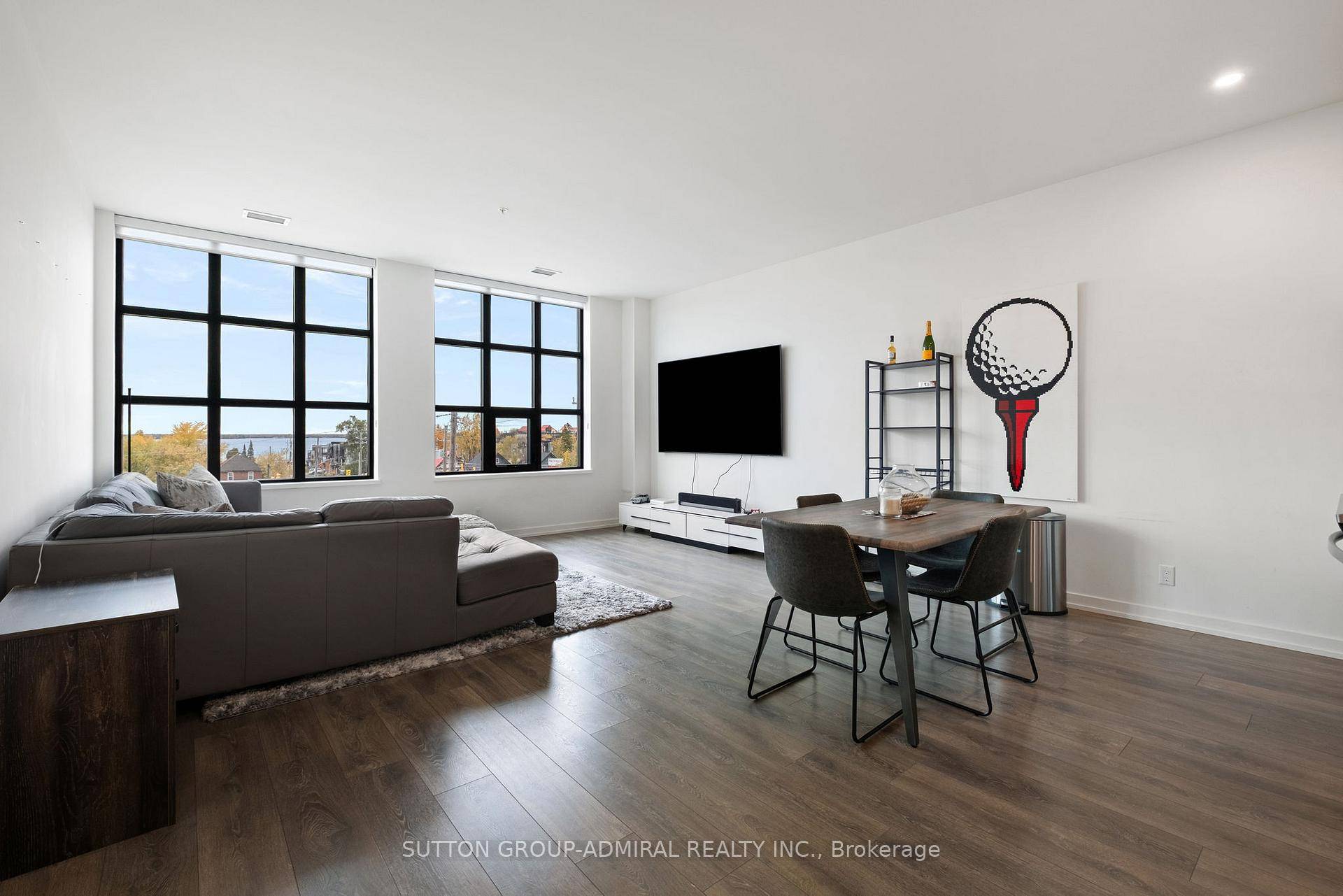 Lakeview Loft Living in the Heart of Orillia WITH DIRECT WATER VIEWS Welcome to Matchedash Lofts, where modern design meets downtown convenience.