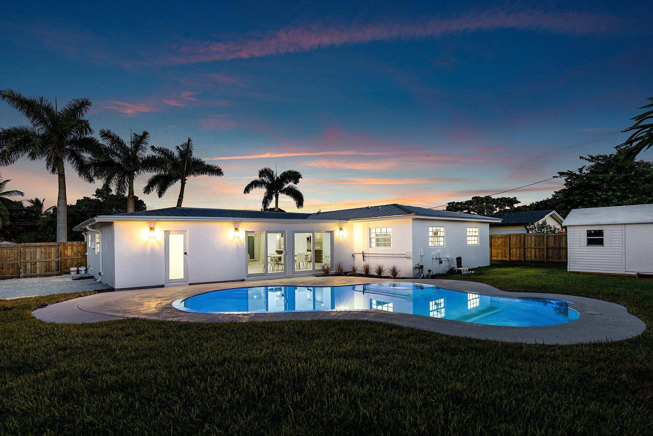 Stunning 4 Bedroom Home with Modern Upgrades and Resort Style Pool !