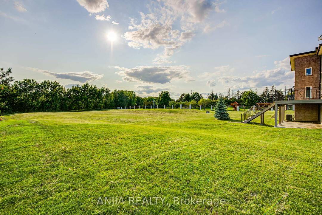 Welcome to 44 Bellini Ave, an Impressive Estate Home on Over 2 Acres with Ravine Privacy.