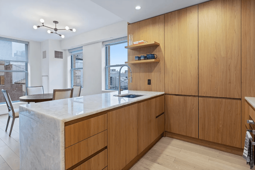 Perched on the 12th floor of a boutique Flatiron condominium, this immaculately renovated 2 bedroom, 2 bath residence offers three sunny exposures, a private keyed elevator entrance and central A ...