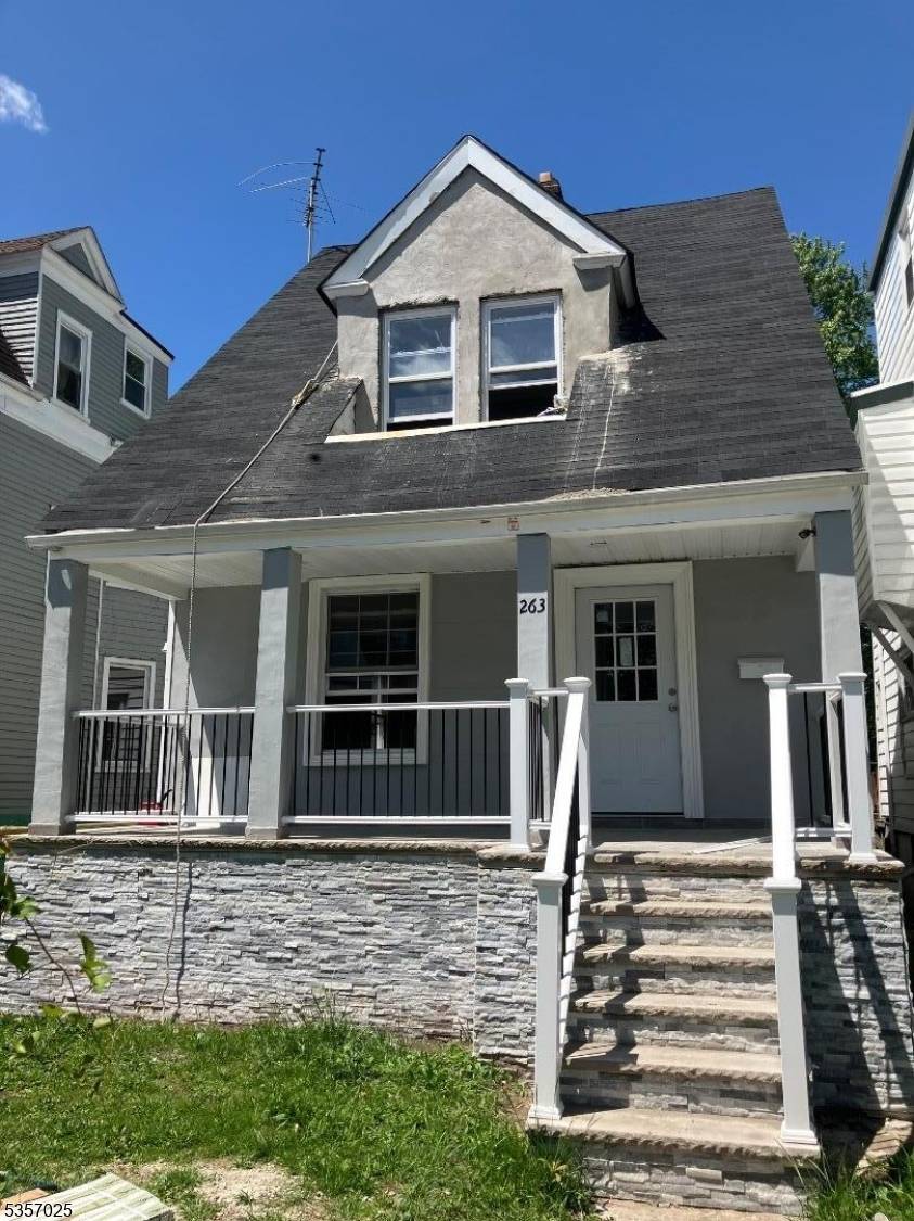 Totally Renovated Home with finished basement and 2 car garage.