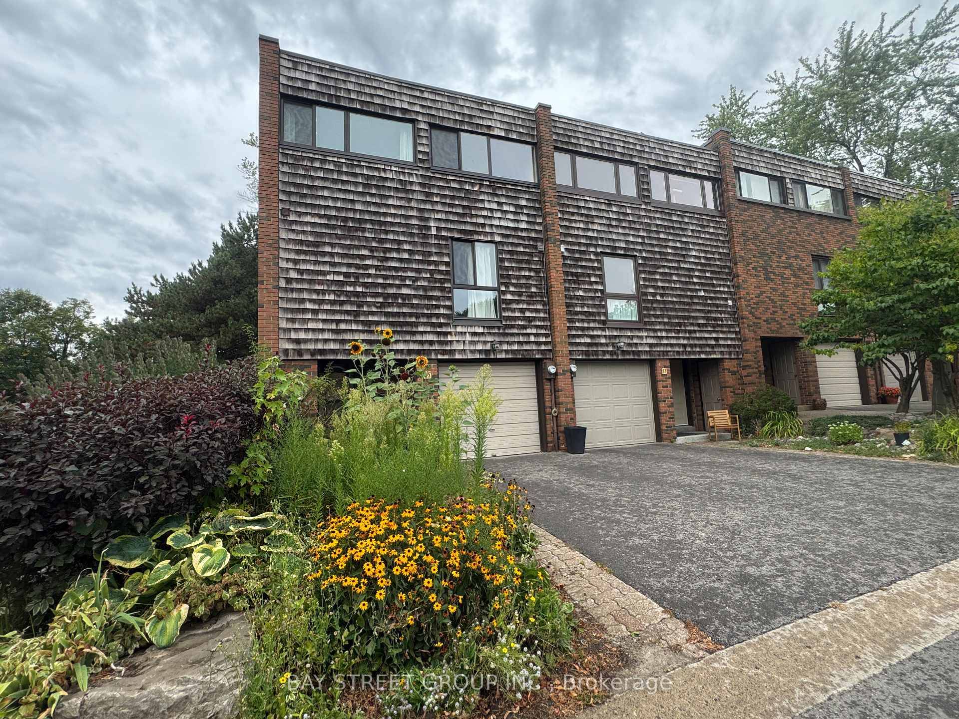 Rarely available, Spacious and newly renovated end unit townhouse with spent on upgrades.