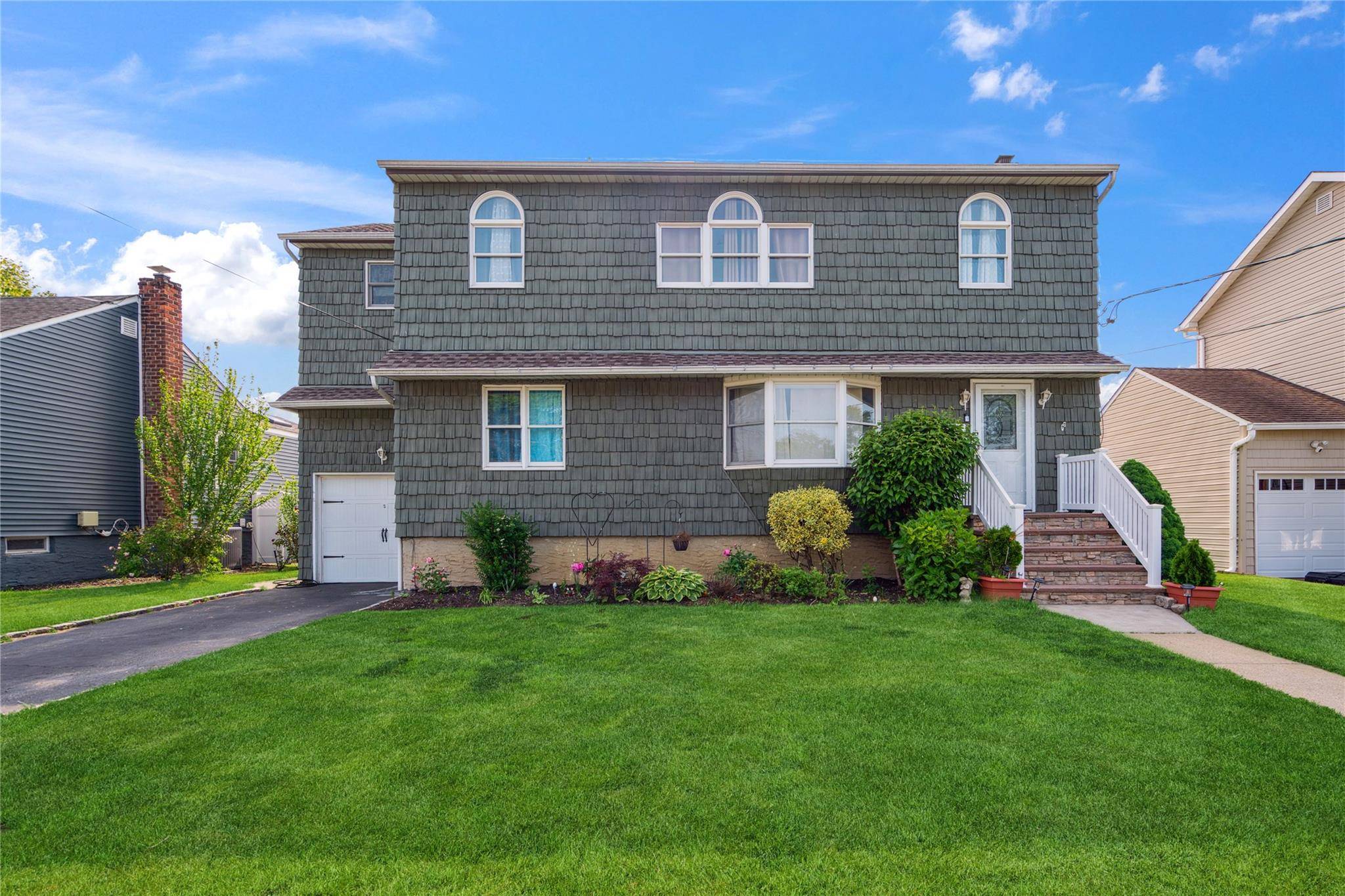 Welcome Home To This Spacious Expanded Ranch In Massapequa Park.