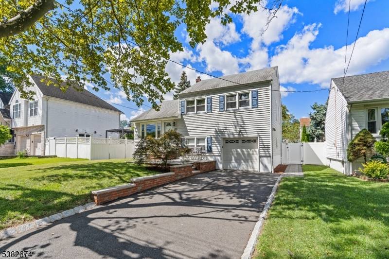 Welcome to this beautifully maintained split level home in the desirable Rahway community just minutes from Tully field.