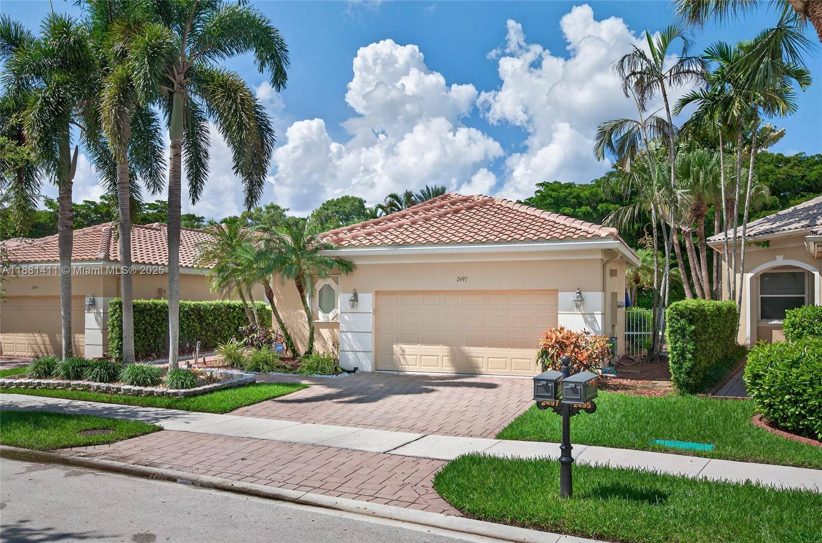 Exquisite 3 bedroom, 3 bath one story home in the exclusive Bay Isle at Weston Hills Country Club.