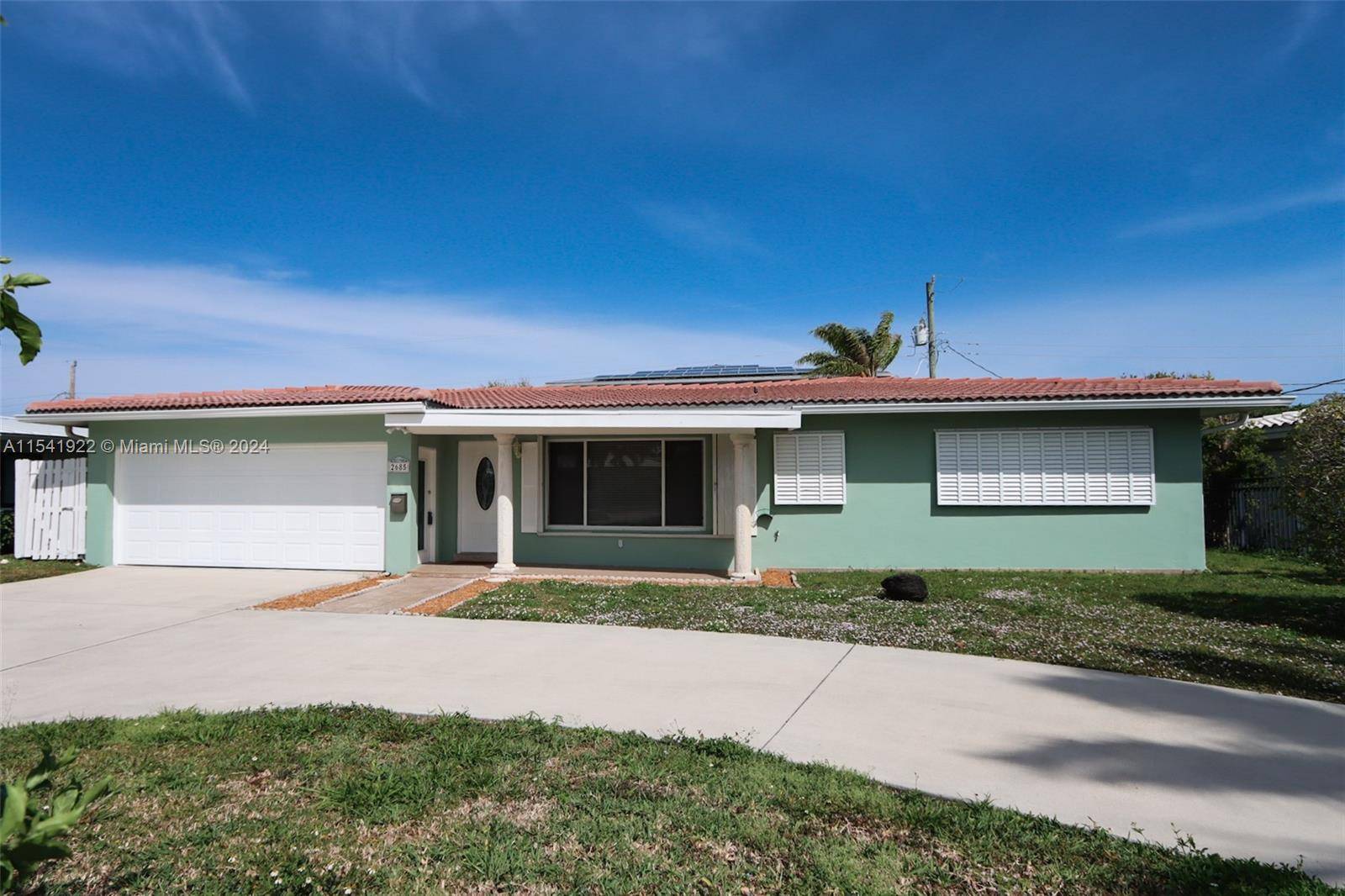East Pompano Beach, 2 bedrooms and 2 bathrooms, 2 car garage.