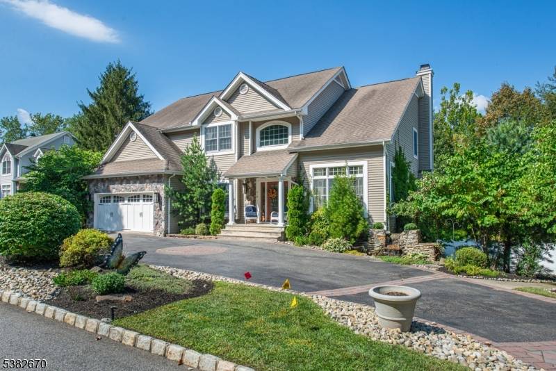 Imagine waking up each morning in a residence that perfectly blends luxury with comfort in sought after Ramapo Mountain Estates.