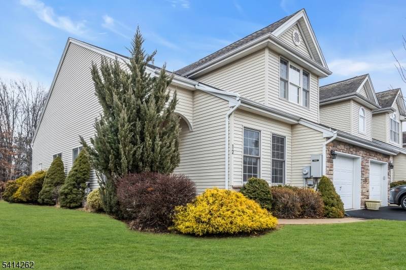 Charming 55 Townhouse with Wooded Views in the front and backyard !