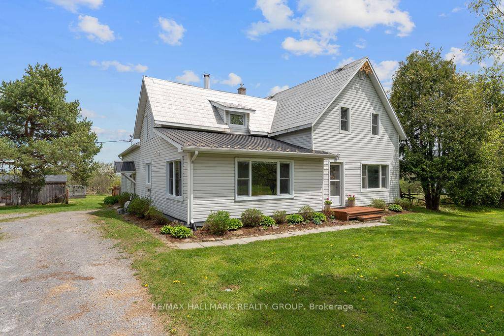 Set on a scenic five acre lot, this warm and welcoming five bedroom, three bathroom country home offers the perfect blend of character and modern updates just a twenty minute ...