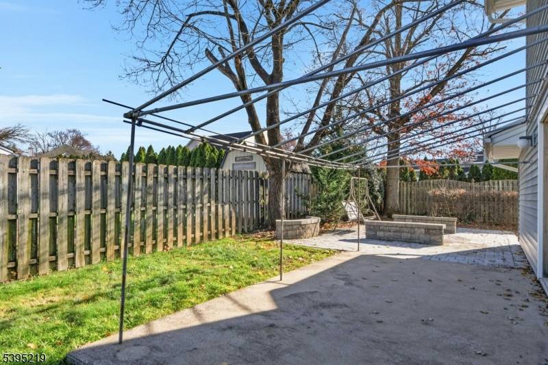 Just reduced ! Elegantly updated stainless steel appliances, while the adjacent dining room opens to a spacious wraparound deck ideal for outdoor entertaining.