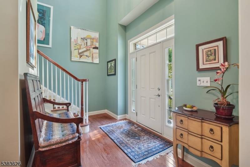 Combining comfort and convenience, this end unit townhome offers well appointed interiors and outstanding amenities with an ELEVATOR !