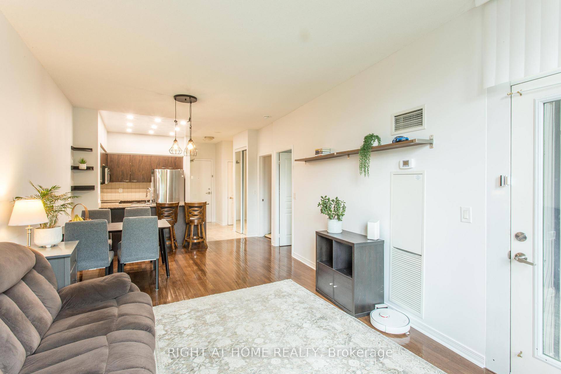 Rare Opportunity ! Discover this bright and modern almost 700 sqft unit with soaring 10 foot ceilings and an exceptional walk out terrace that feels like your own little patio.