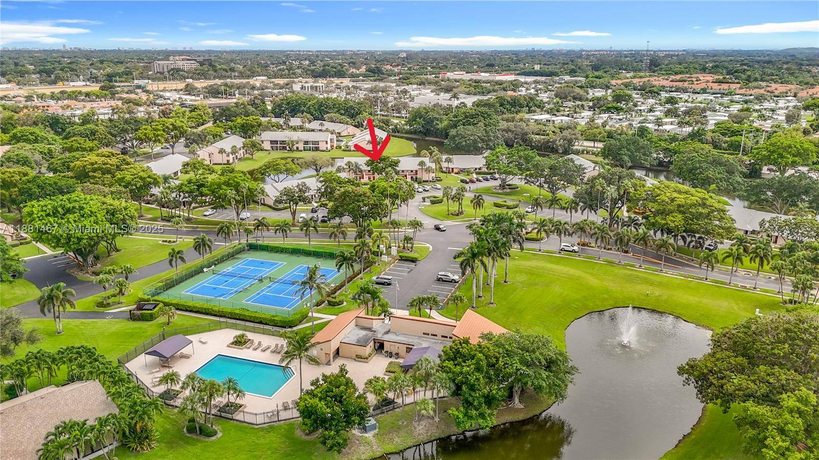 Enjoy beautiful lake views from every room in this 2 bedroom, 2 bathroom Boca Glades home featuring tile floors in the main living areas, wood floors in the bedrooms, granite ...