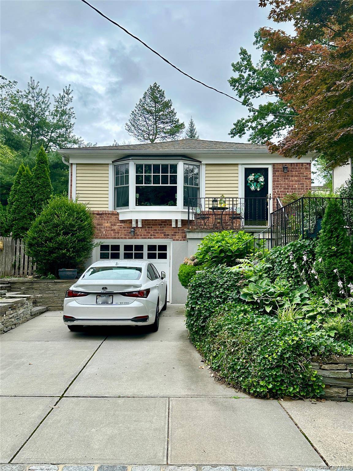 Experience elevated living in this modern and stylish 3 bedroom, 3 bath residence nestled in the heart of Douglaston.