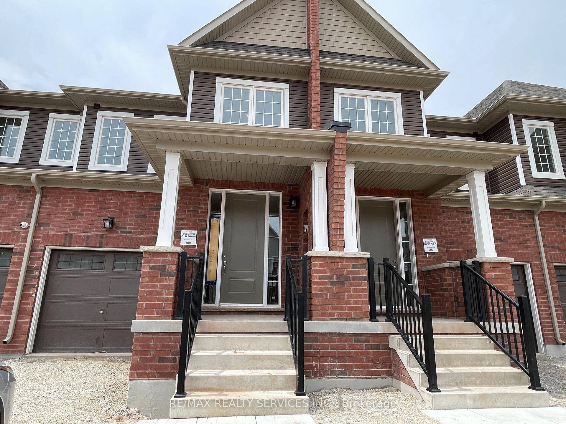 Welcome to this NEVER LIVED IN stunning upgraded freehold townhome in the heart of Erin.