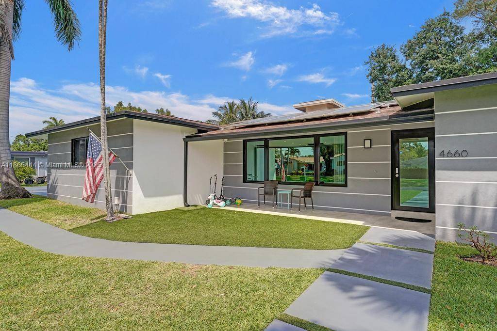 Stunning Waterfront Home in Davis Isles This fully renovated 5 bedroom, 3.