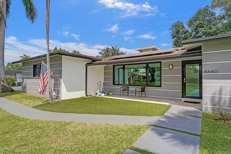Stunning Waterfront Home in Davis Isles This fully renovated 5 bedroom, 3.