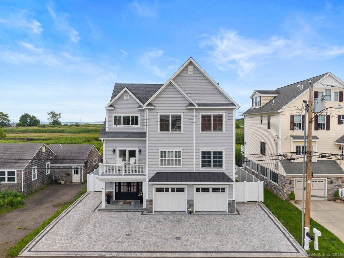 Never before listed. A rare opportunity to own a true coastal masterpiece 84 Cooper Avenue a custom built, luxury colonial in the sought after Silver Sands Beach enclave.