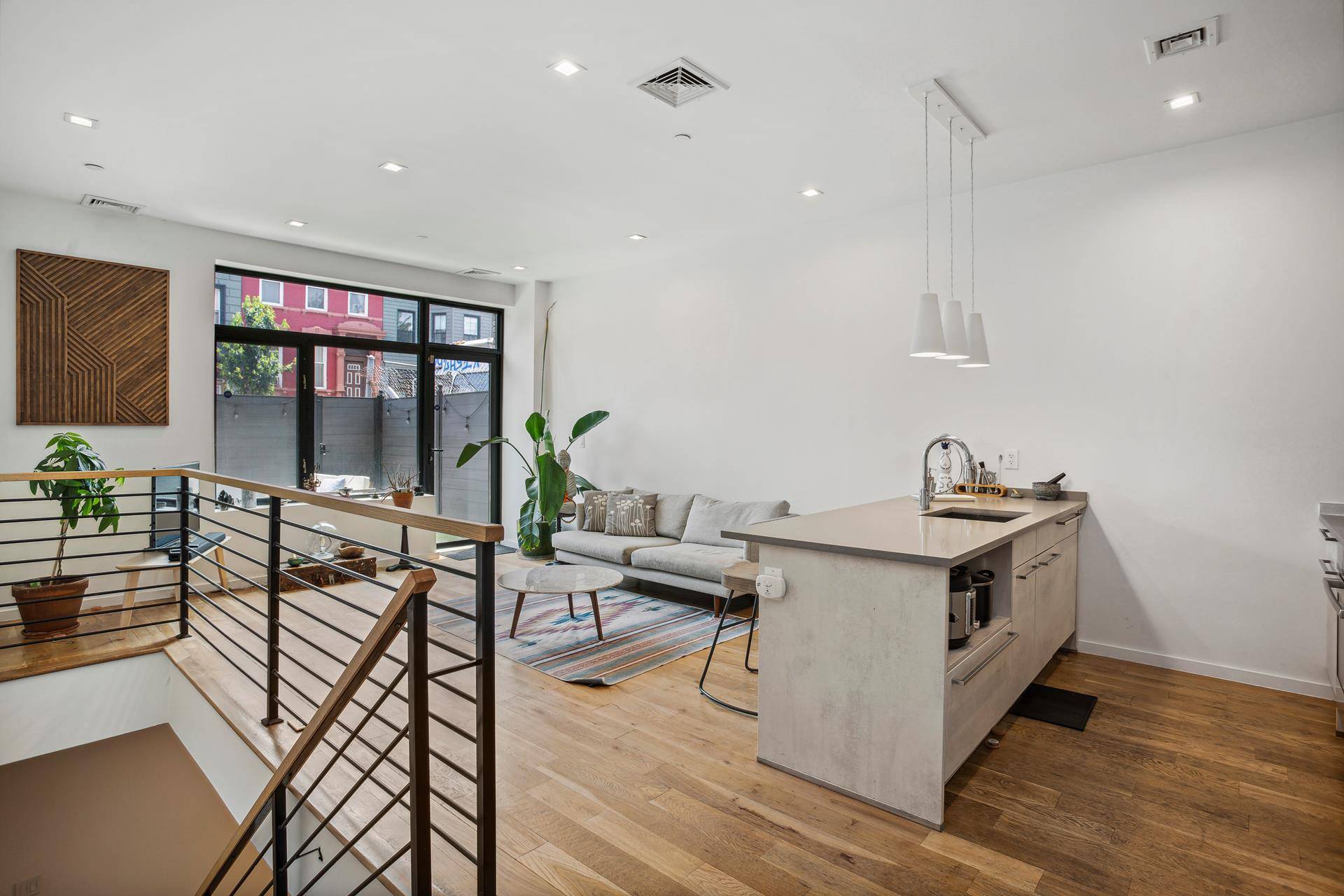 This exquisite duplex apartment offers a perfect blend of modern amenities and charming features, making it a true gem in Brooklyn.