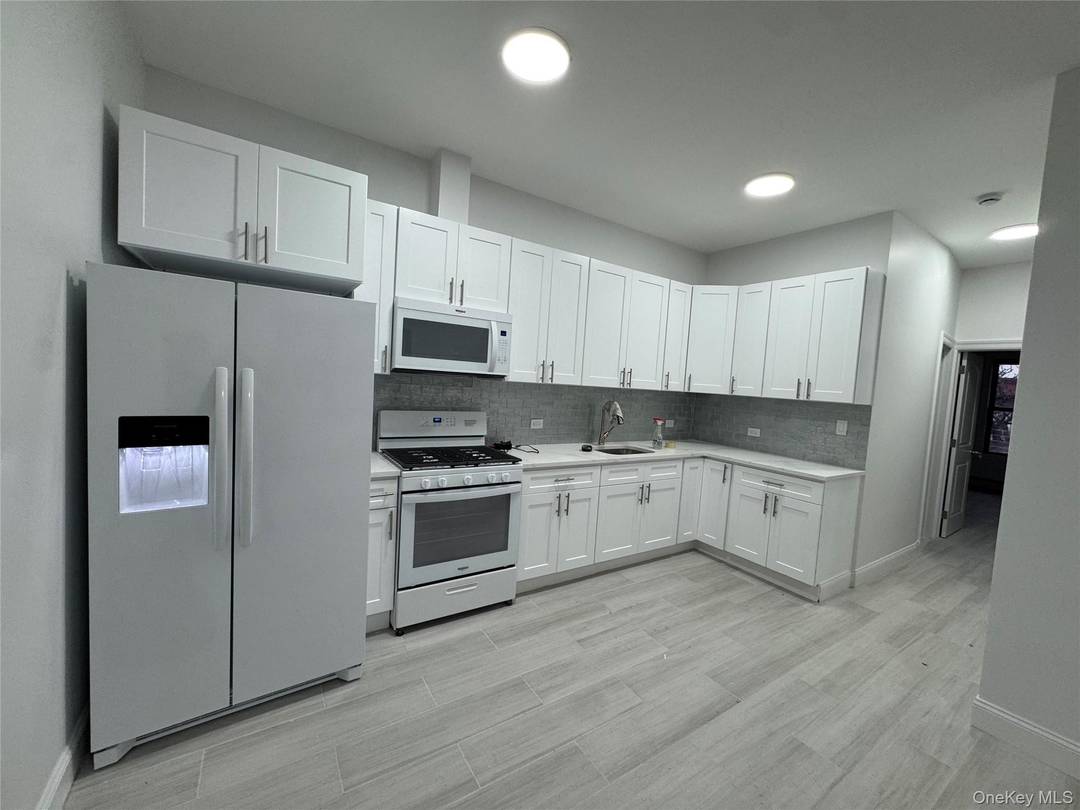 Freshly painted, new floors on the entire apartment, 2 skylights, 3 big bedrooms with huge closets a lot of windows, living room, kitchen with all appliances, refrigerator with ice maker, ...
