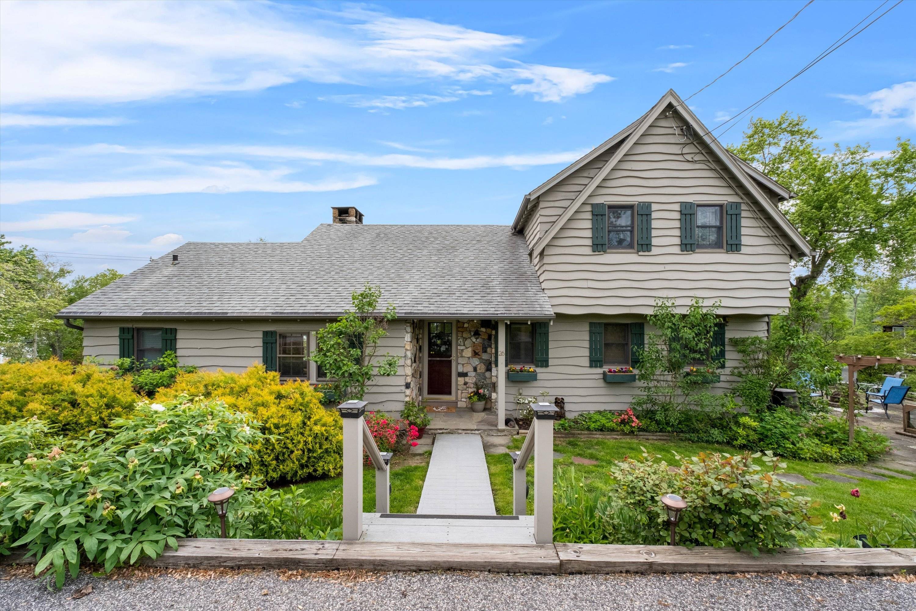 Quintessential Candlewood Lake House located in the desirable Candlewood Lake Club, this stunning home offers the perfect blend of lifestyle and luxury.