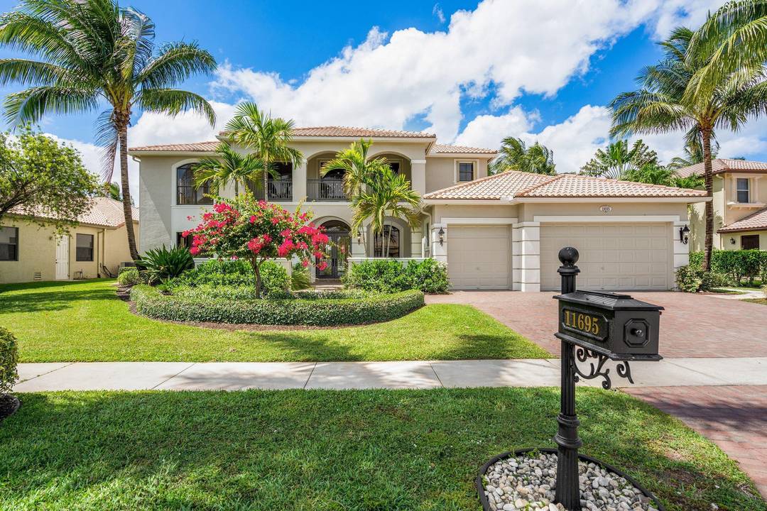 Exquisite Luxury Rental The Estates at The Isles Step into paradise with this flawlessly upgraded, turnkey furnished estate in the prestigious gated enclave of The Estates at The Isles.