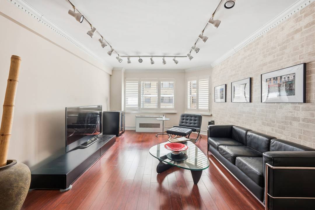 Tucked away from the frantic pace of midtown traffic, this corner one bedroom, one bath condominium offers a rare and luxurious commodity absolute tranquility.