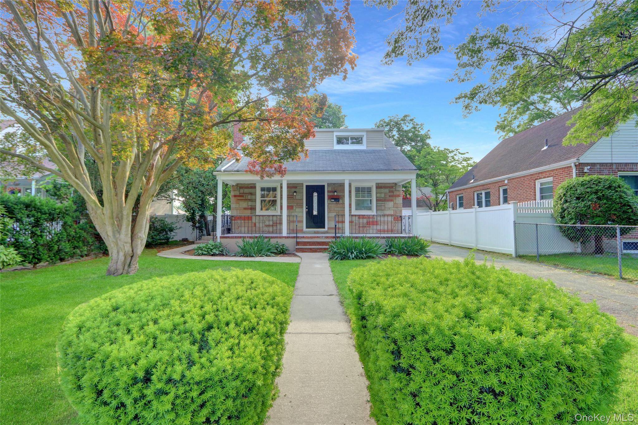 Outstanding and updated Cape Cod style home with gorgeous curb appeal, detached garage, full basement, and exceptional attention to detail in all the beautiful finishes.