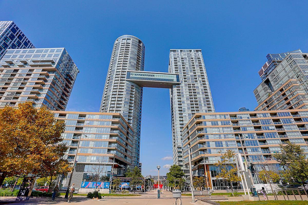 Welcome to this exceptional corner condo unit that seamlessly blends functionality with elegance.
