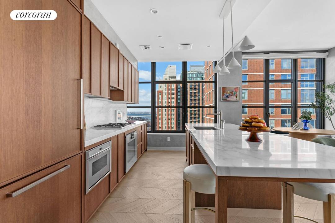 High on the 16th floor, this river facing corner two bedroom at Front amp ; York has been fully customized with elevated, design driven upgrades rarely seen in the building.
