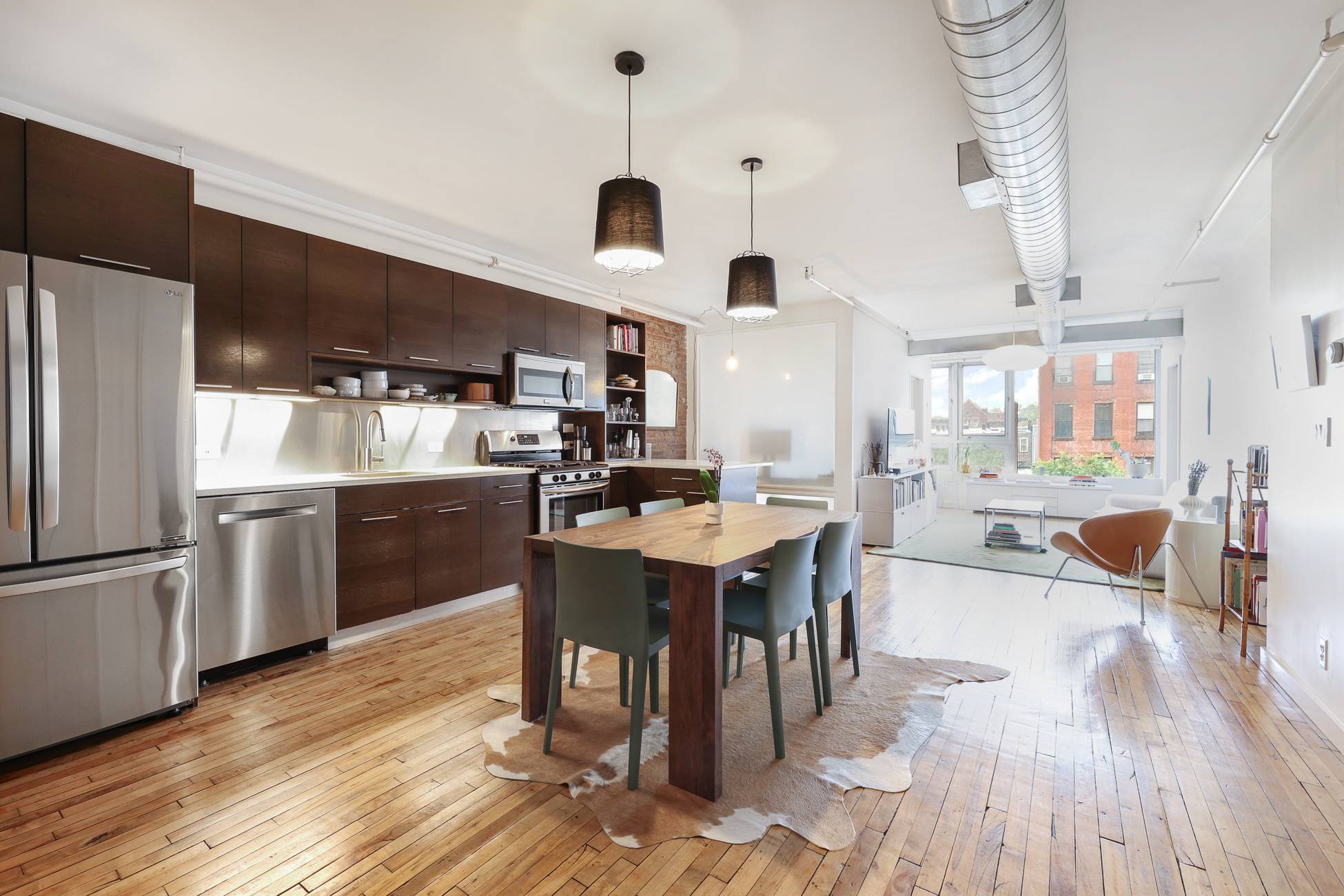 Once the home of a trolly factory, this historic property retains much of its original character and industrial roots.