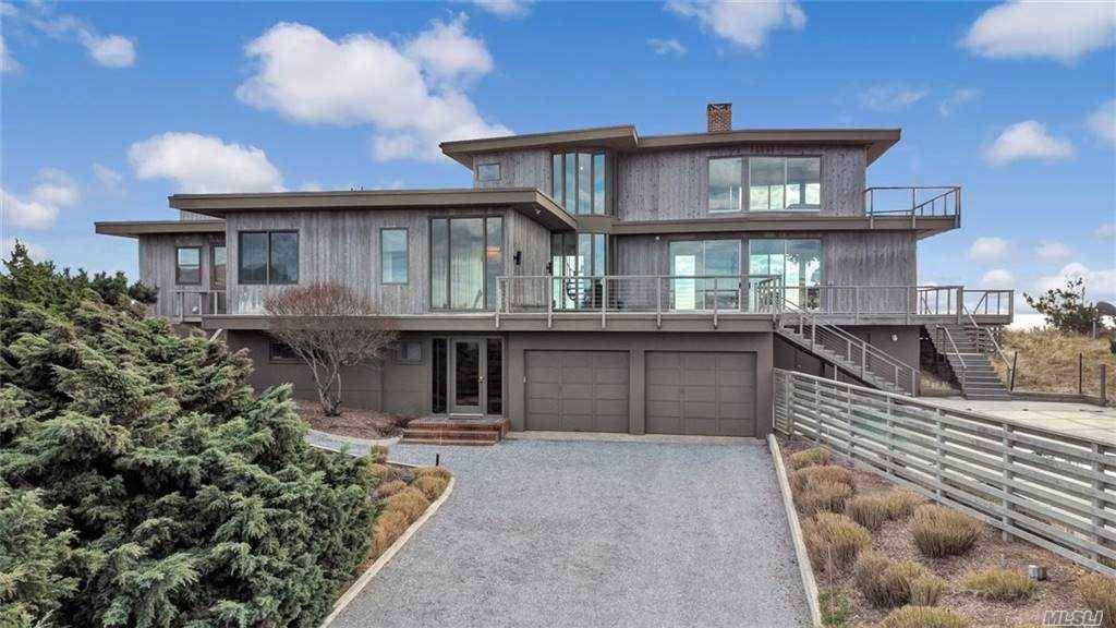 Unique Opportunity the best oceanfront available multi level contemporary with Brazilian wood floors, two master exquisite bedroom suites, four additional guest bedrooms one en suite, open living room and dining ...