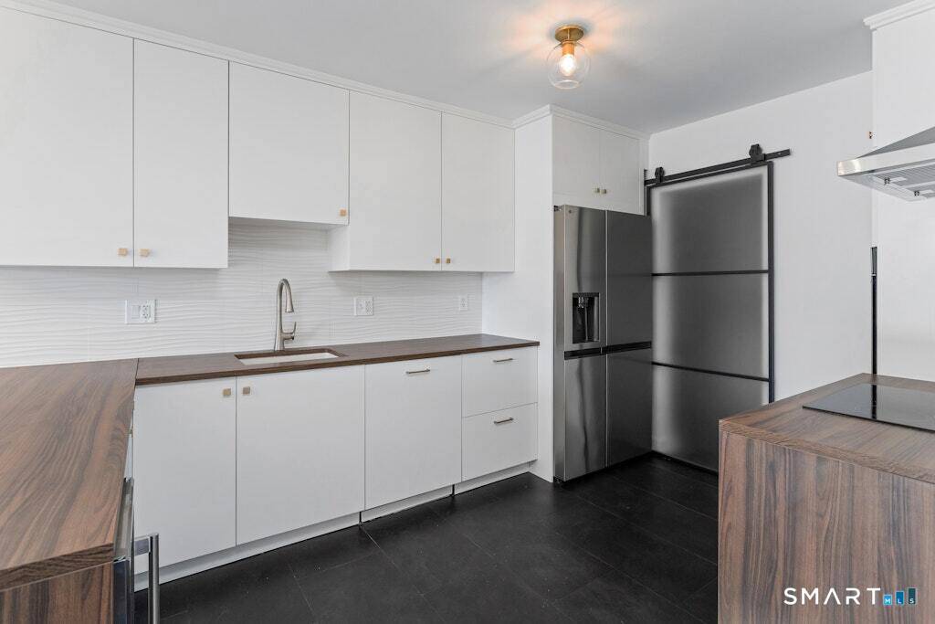 Experience upscale living at Tamarac, a sought after enclave known for its blend of elegance, privacy, and daily convenience.