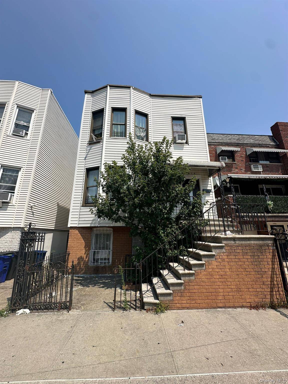 Imagine a grand, nine bedroom estate nestled in the prestigious locale of Morris Park.