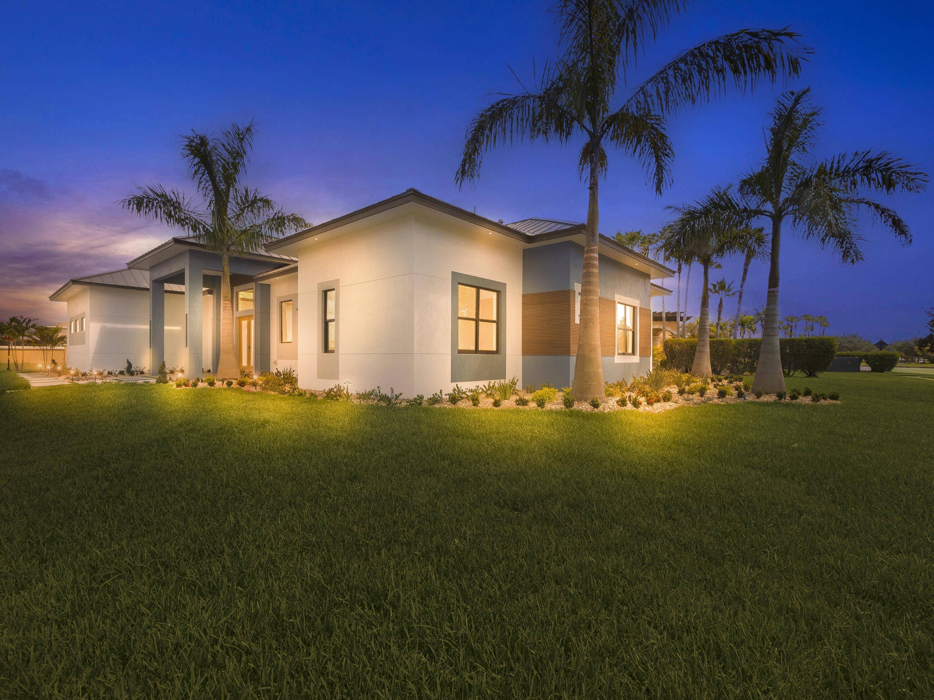 Welcome to an extraordinary contemporary estate pool home in the highly sought after Westcliffe Estates at Tradition.