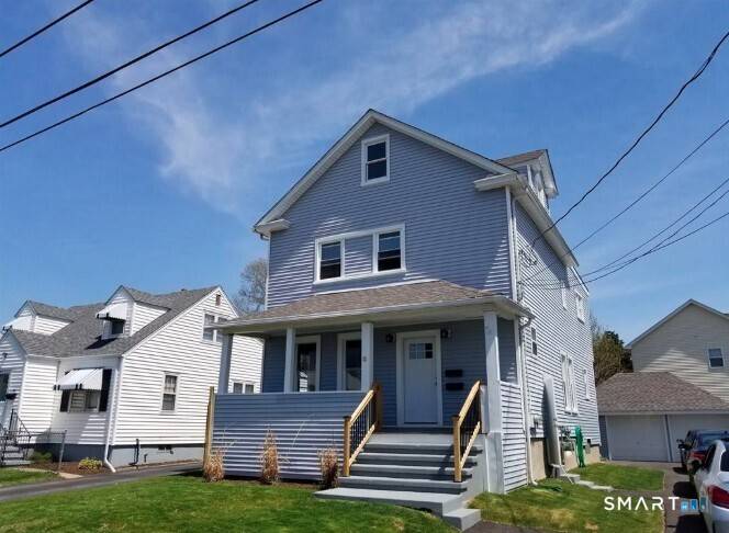 Meticulously maintained two family home with major recent upgrades.