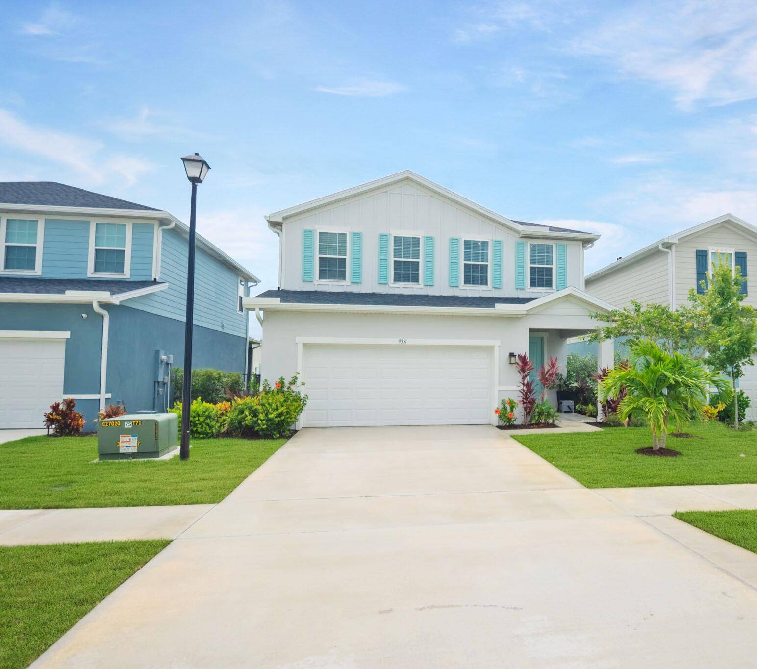 Lakefront luxury meets functionality in this stunning 4BR 3BA 2CG two story pool home with flex room in Central Park at Tradition !