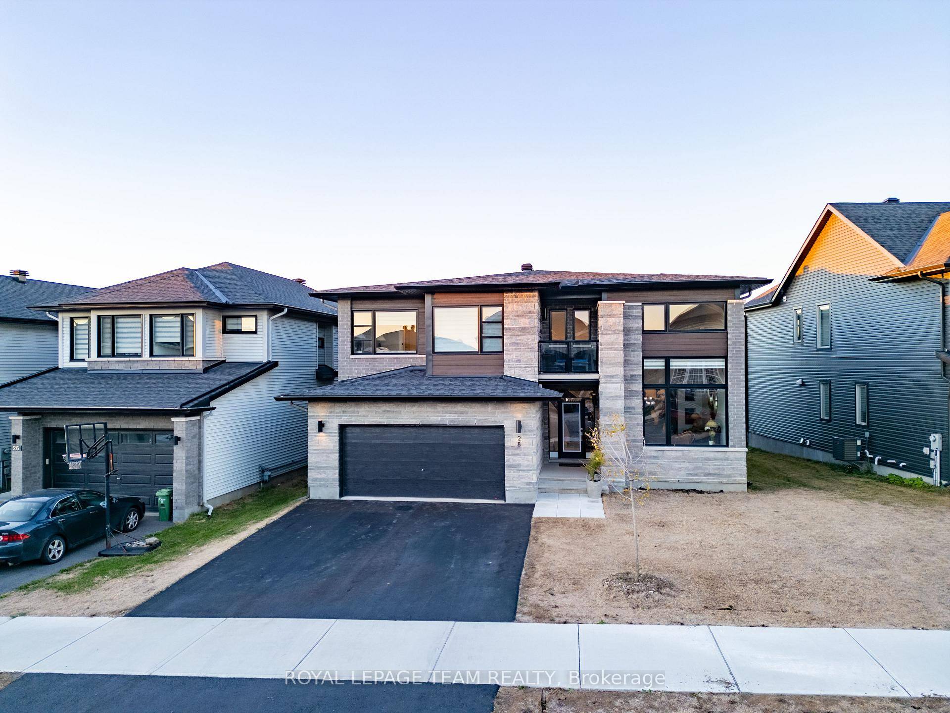 Welcome to 28 Dun Skipper Drive where luxury meets lifestyle in Findlay Creek.