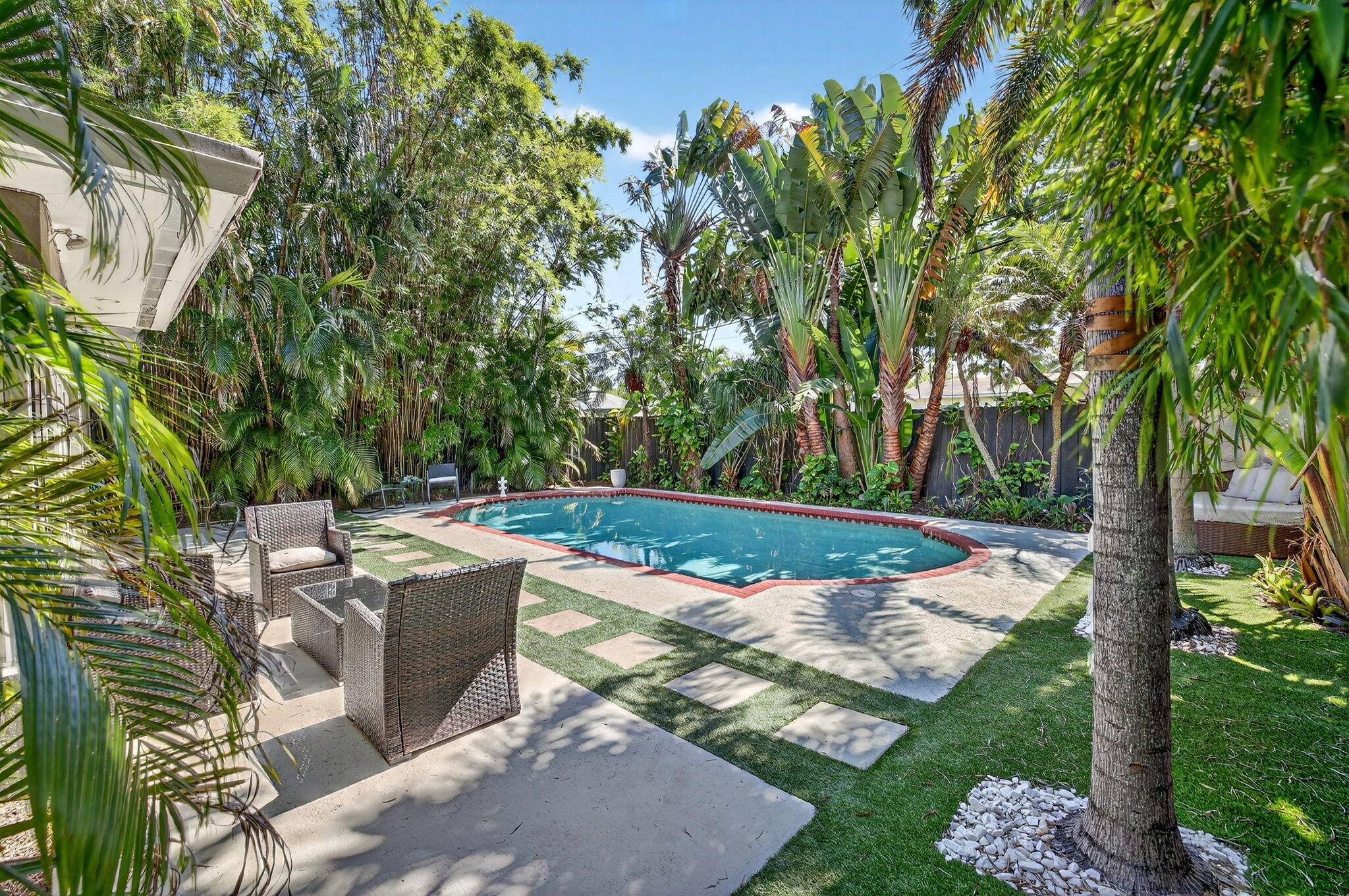 This enchanting 2 bed 2 bath mid century modern home is a true oasis, seamlessly blending style with everyday comfort.