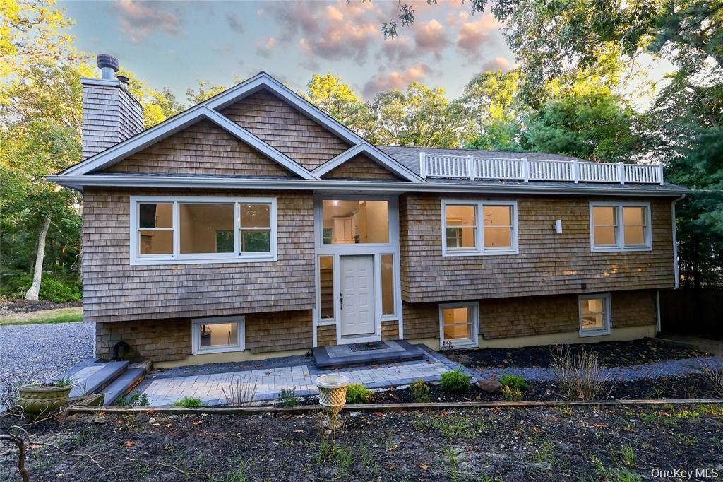 Welcome to this beautifully maintained Colonial in the Red Creek area of Hampton Bays.