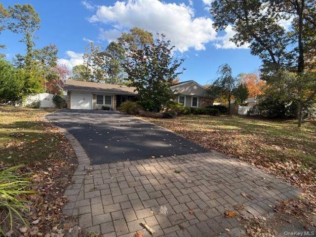 Beautiful expanded ranch in the desirable area of Stony Brook !