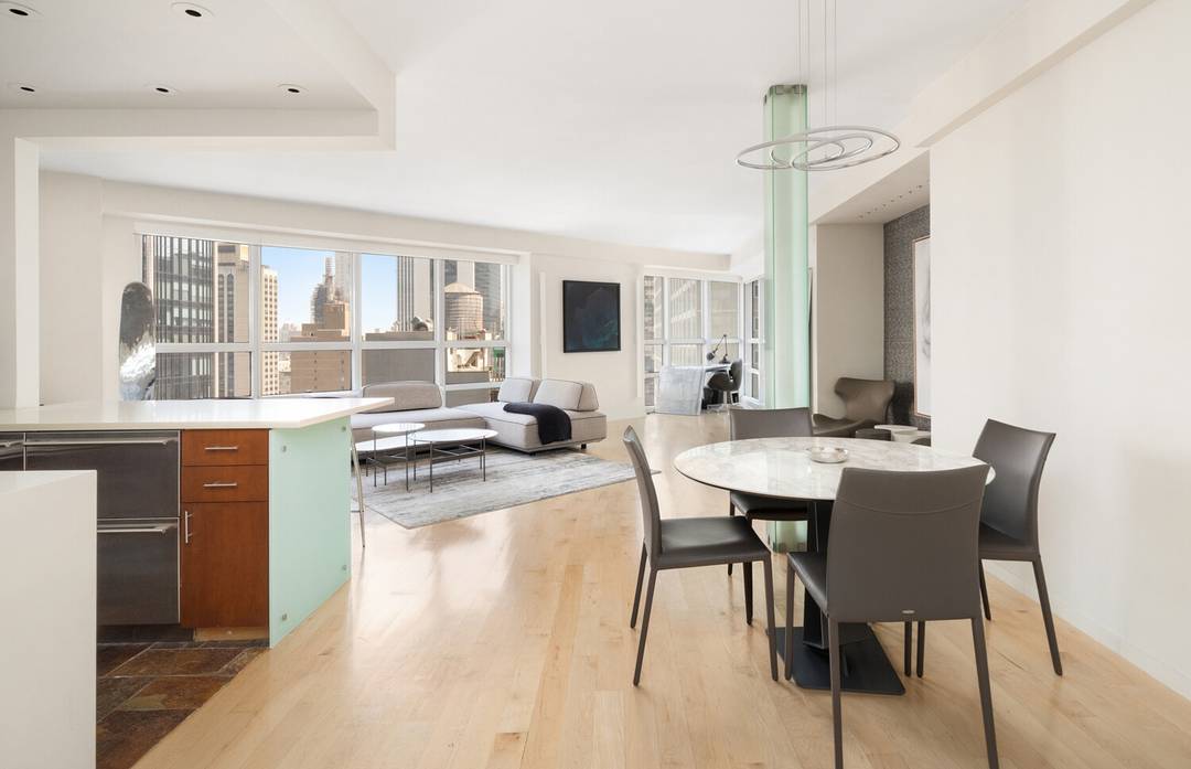 Welcome to your urban oasis nestled in the prestigious address of 146 West 57th Street, 39D.
